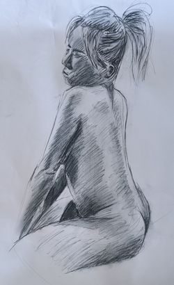 A charcoal sketch of a woman sitting facing slightly away from us