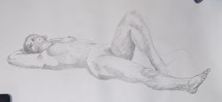 A pencil sketch of a woman lying across the picture with one knee lifted