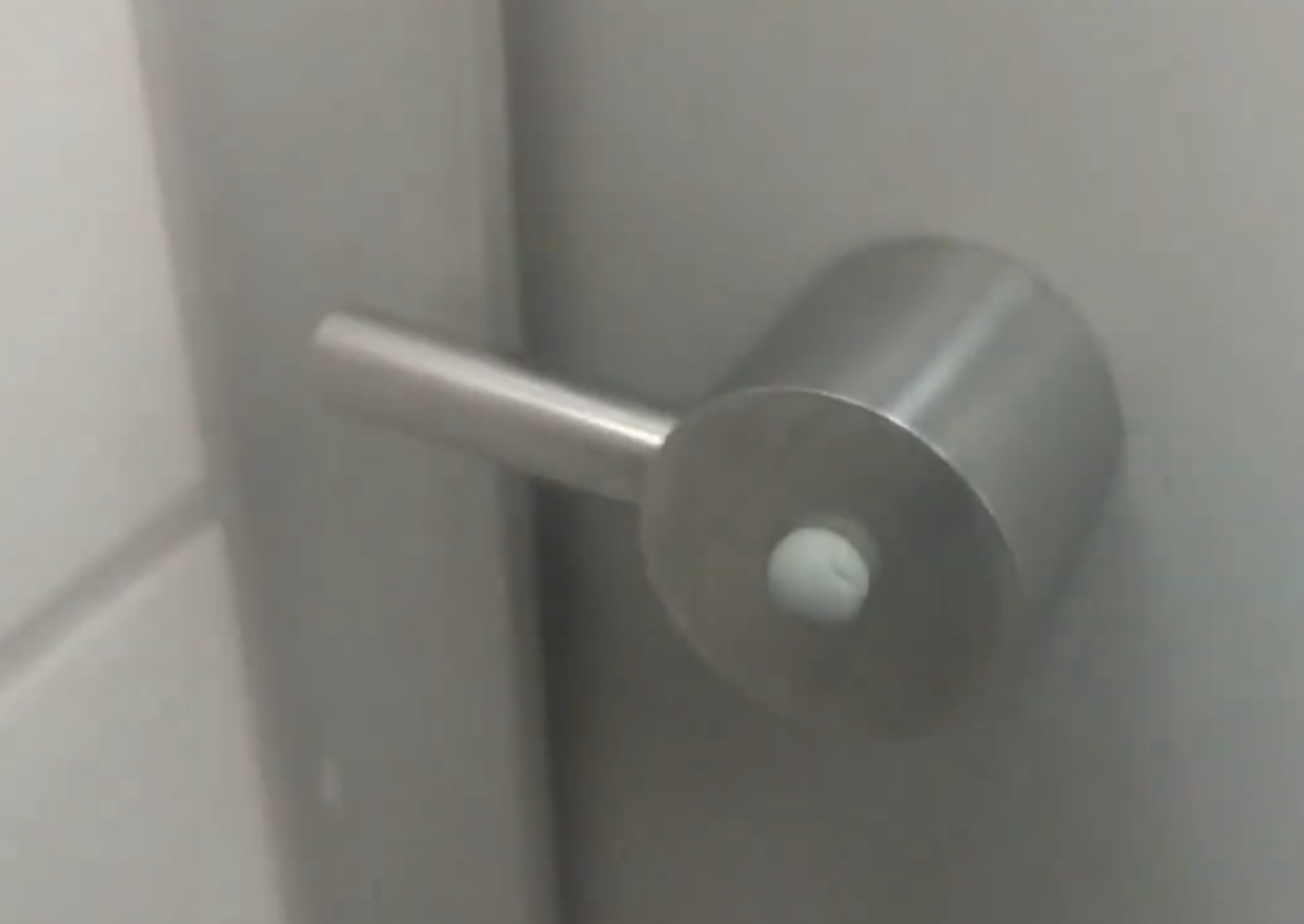 A lock on a bathroom door